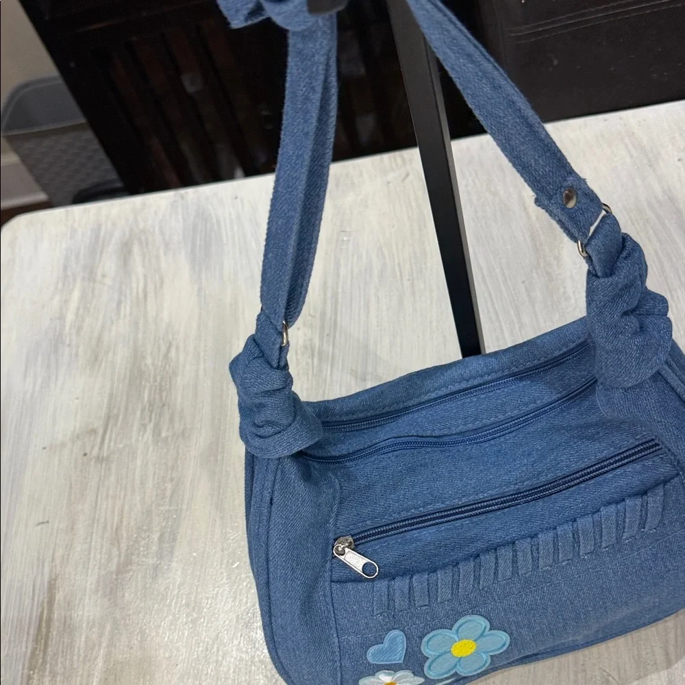 Chic Blue Denim Hobo Bag with Floral Accents